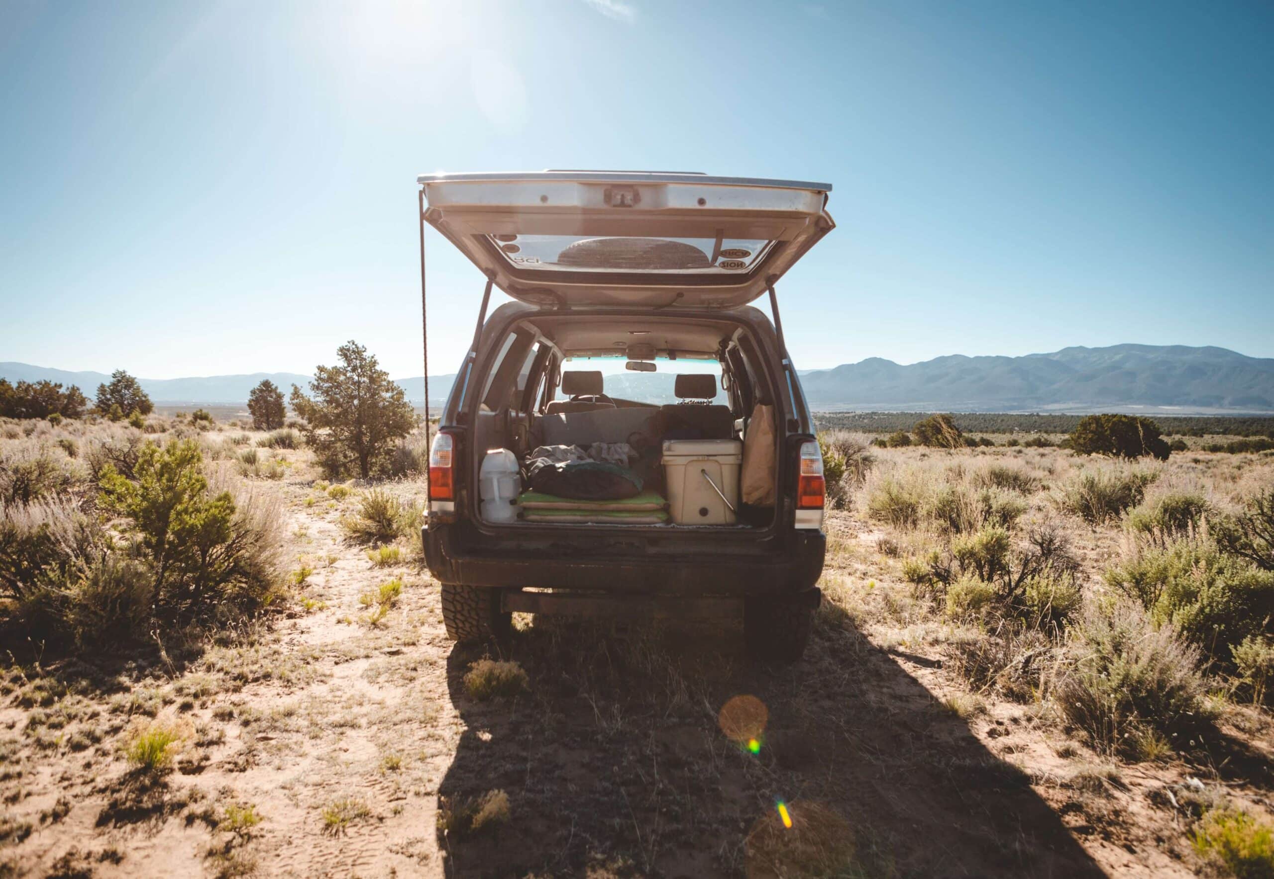 SUV with camping gear | Featured image of the Off Road Camping Tips Blog by Bus 4x4 Group.